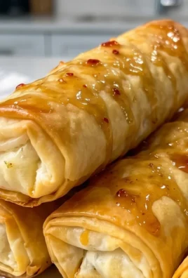 Indulgent Oven Fried Feta Rolls with Chili Honey Magic