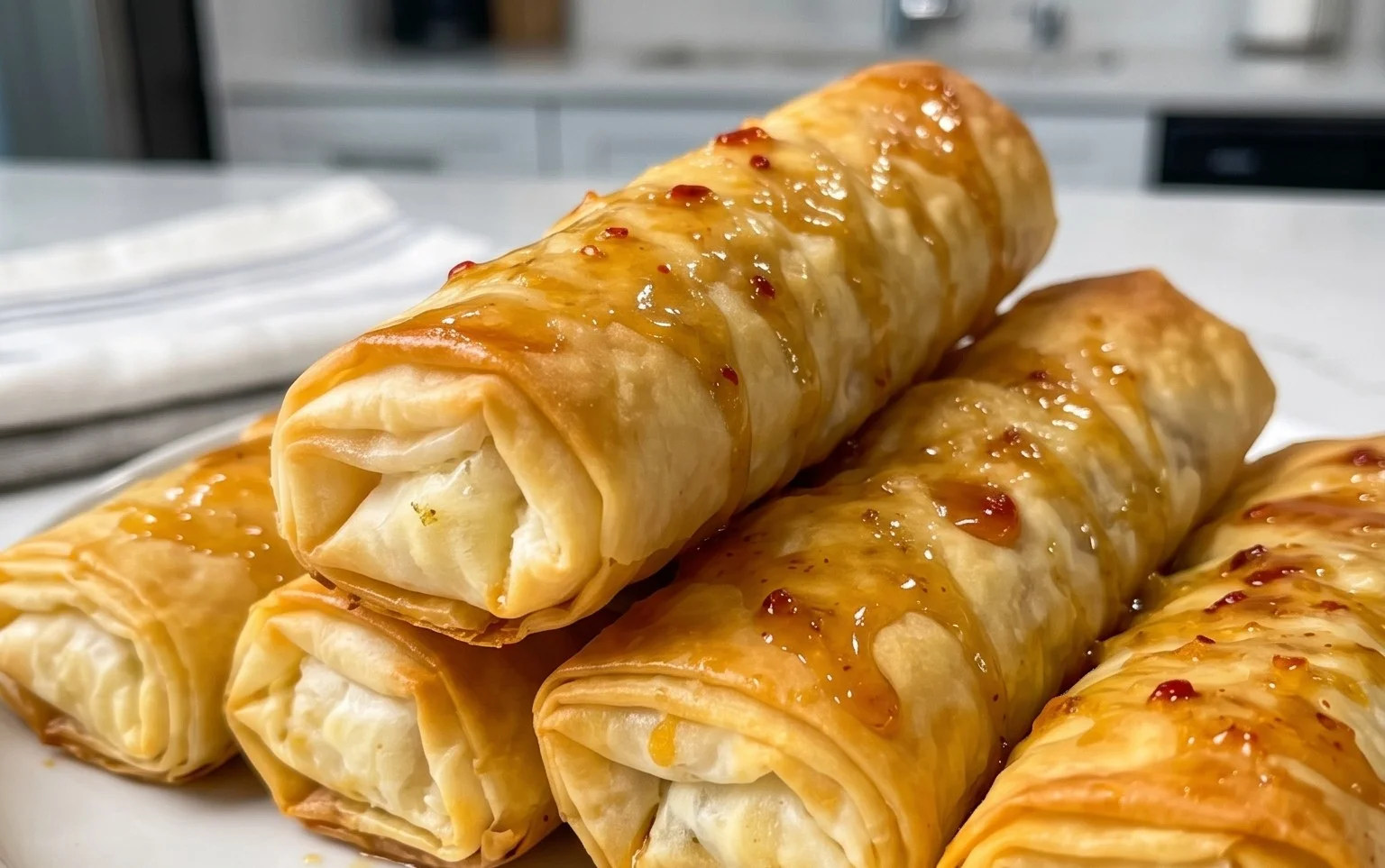 Indulgent Oven Fried Feta Rolls with Chili Honey Magic